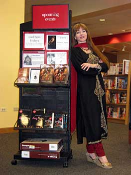 Chicago area author Andrea Jones commandeered Borders Books in Naperville to promote her new novel, Hook & Jill, a 'grown-up' vision of Peter Pan.